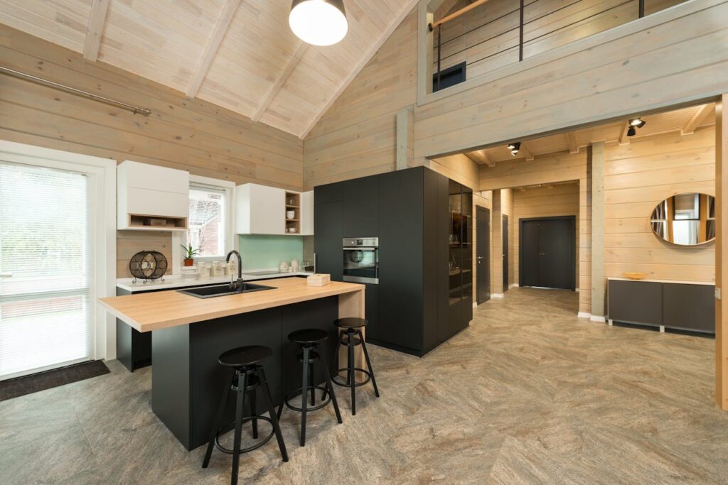 pexels-photo-7061401 A stylish modern kitchen featuring wooden accents and minimalist design.